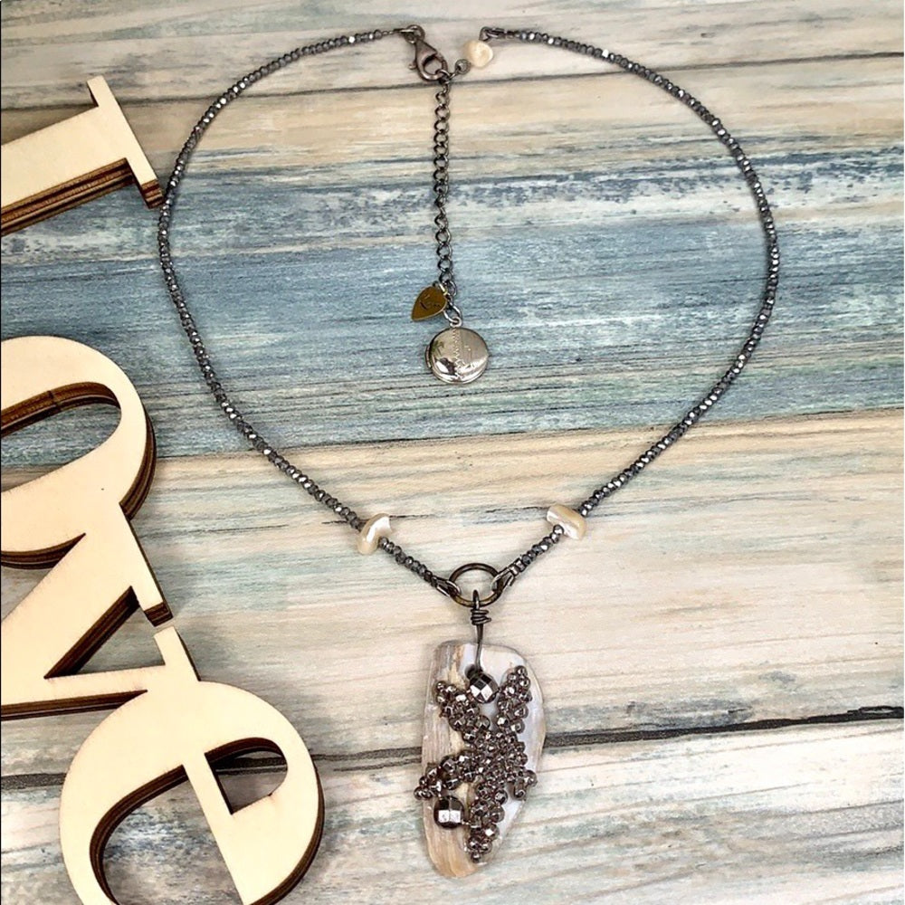 Adorned Crown artisan assemblage shell cut steel beaded minimal necklace
