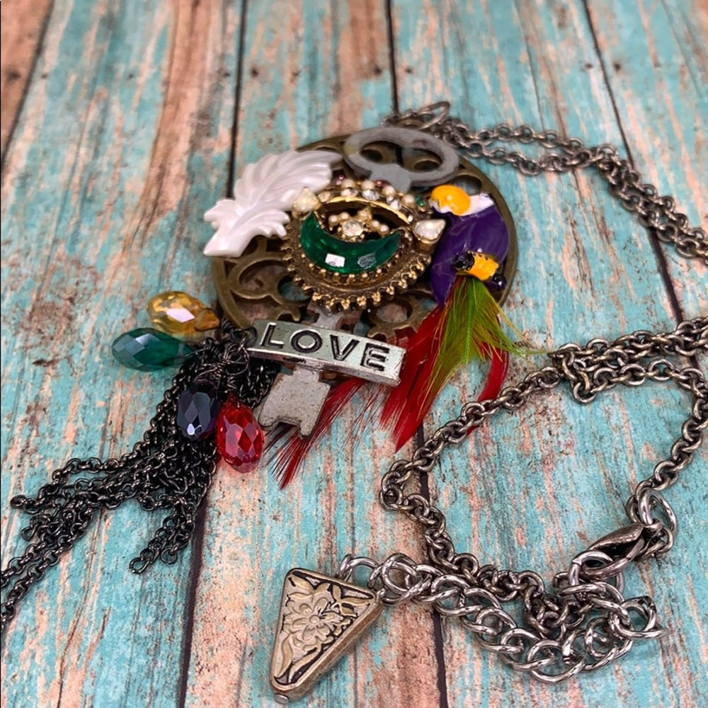 Adorned Crown artisan assemblage jungle toucan bird key cluster necklace