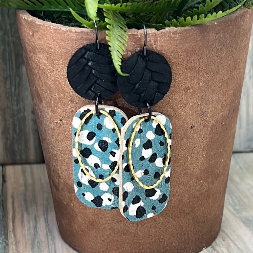 Adorned Crown Artisan Assemblage dotted leather faux leather oval earrings