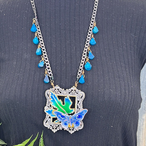 Adorned Crown Artisan Assemblage enamel blue framed butterfly leaf necklace