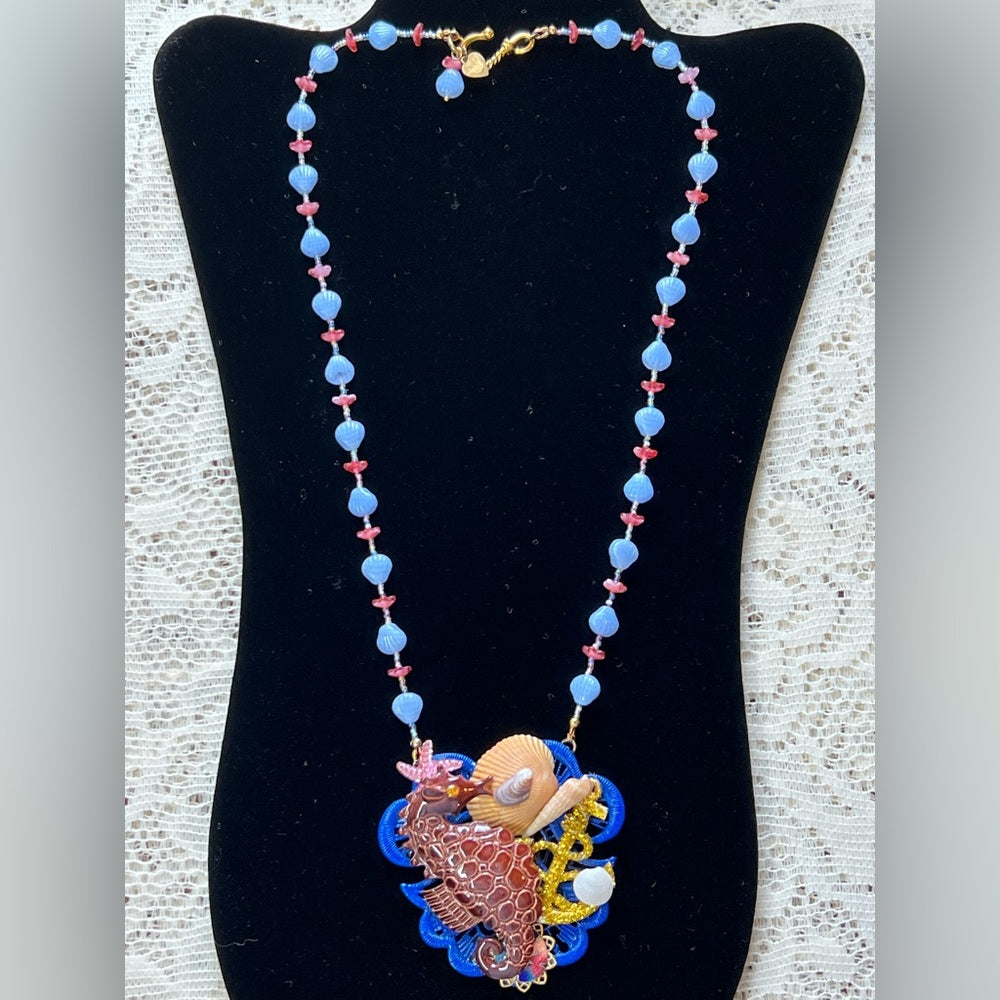 Adorned Crown Assemblage beaches & butterflies seahorse collage necklace