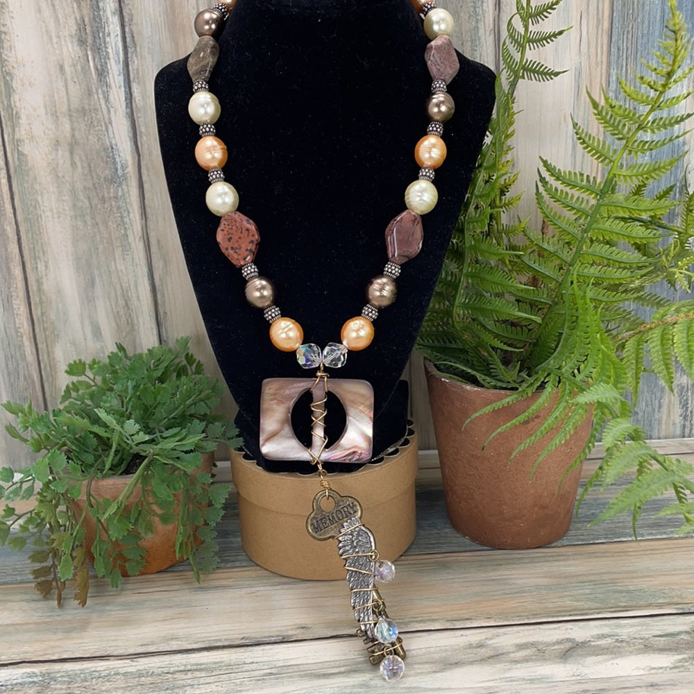 Adorned Crown Artisan assemblage shell buckle skeleton key necklace