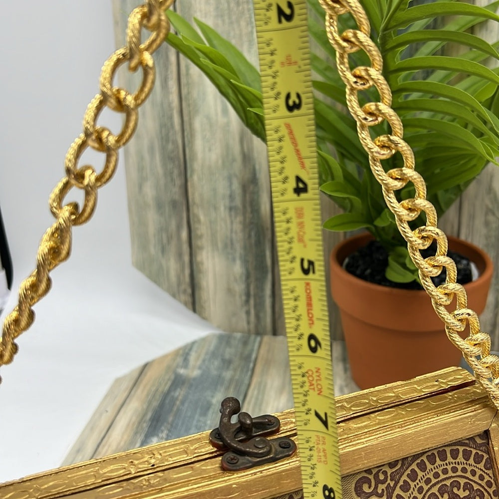 Adorned Crown Altered wood hinged big button gold handle green tassel purse