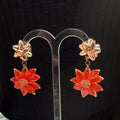 Adorned Crown Jewelry assemblage Christmas bow poinsettia post earrings