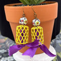 Adorned Crown Jewelry assemblage yellow cage lamp work glass purple earrings