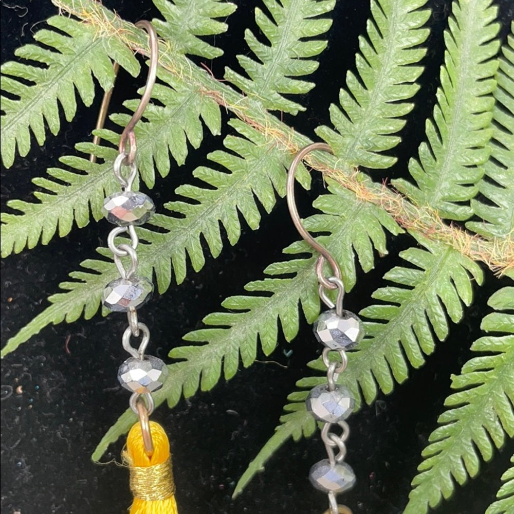 Adorned Crown assemblage yellow tassel crystal drop earrings