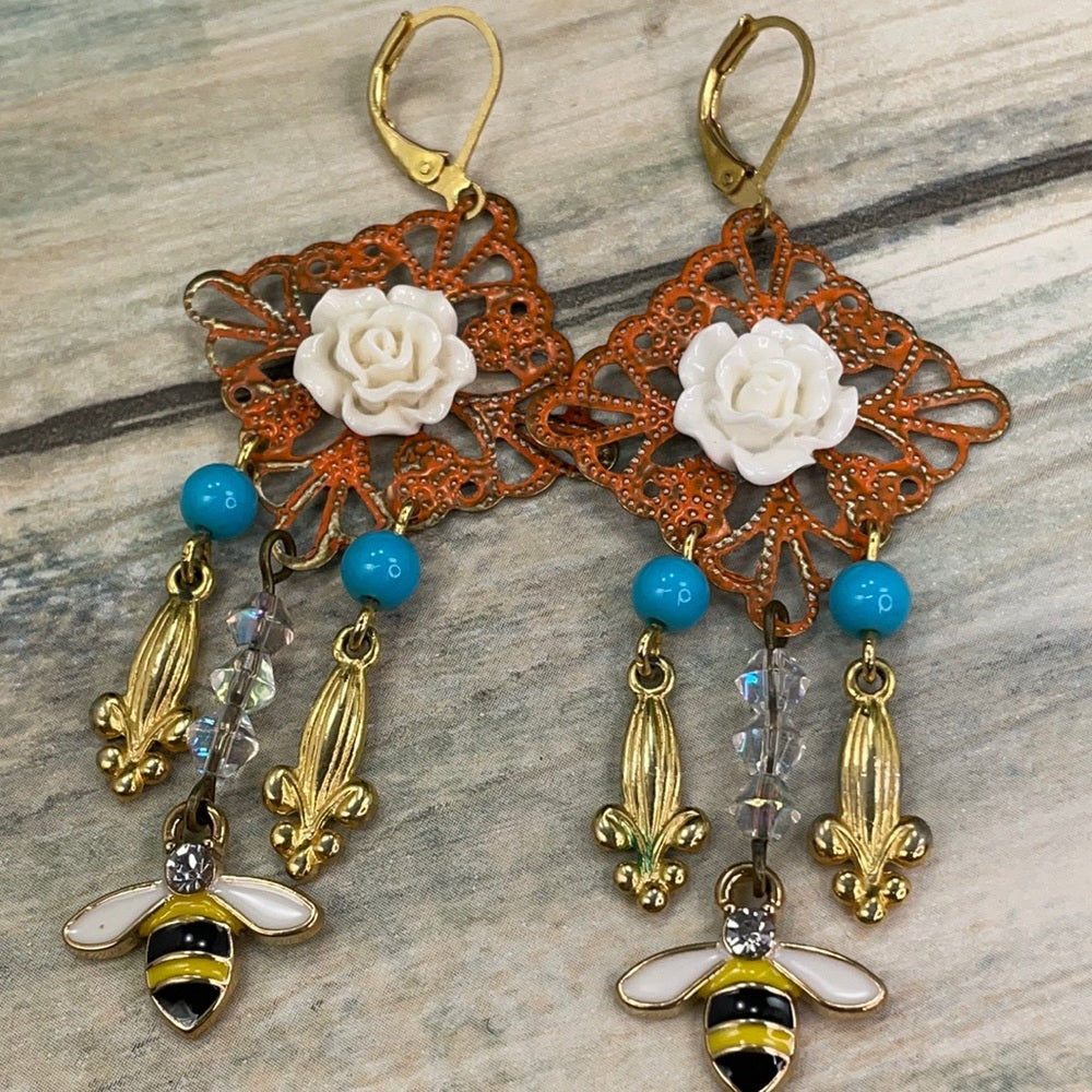 Adorned Crown assemblage buzzing bee earrings