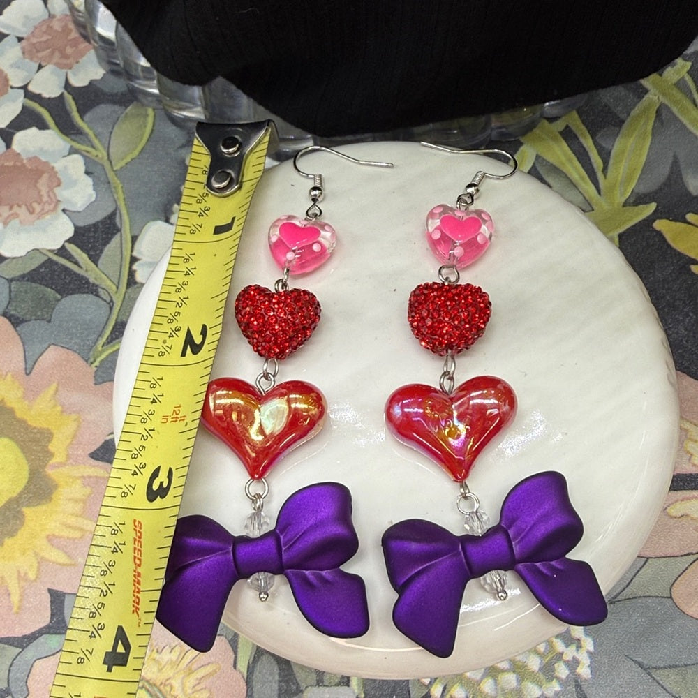Adorned Crown Jewelry pink heart glitter red bows Valentine's Day earrings