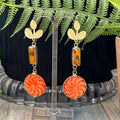 Adorned Crown Artisan Assemblage lucite button topaz gold leaf earrings