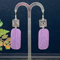 Adorned Crown Artisan purple genuine leather drop swirl earrings
