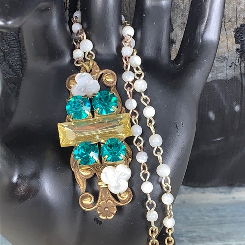 Adorned Crown Artisan assemblage green rhinestone and mop collage necklace