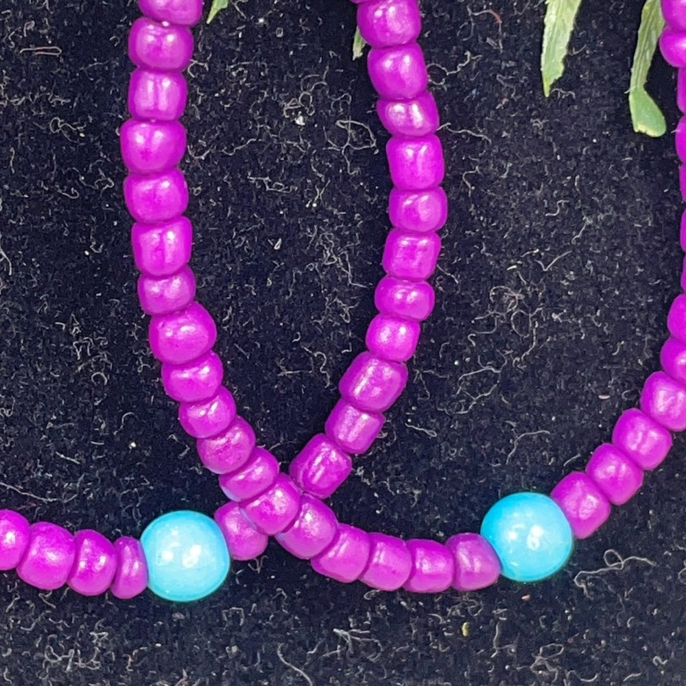 Adorned Crown assemblage pop of color purple hoop earrings