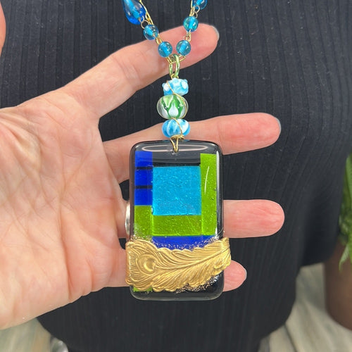 Adorned Crown Artisan Assemblage dichroic glass pendant feather necklace