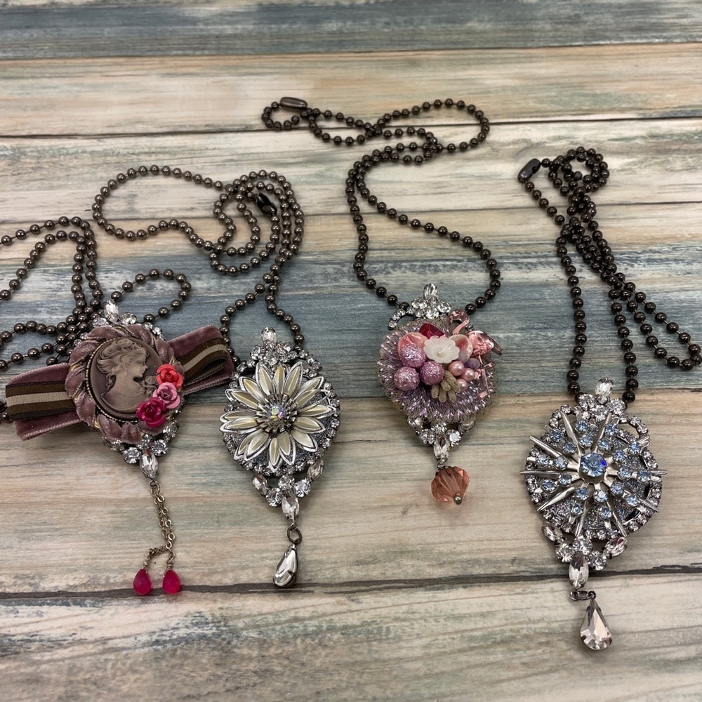 Adorned Crown assemblage Blue cluster necklace