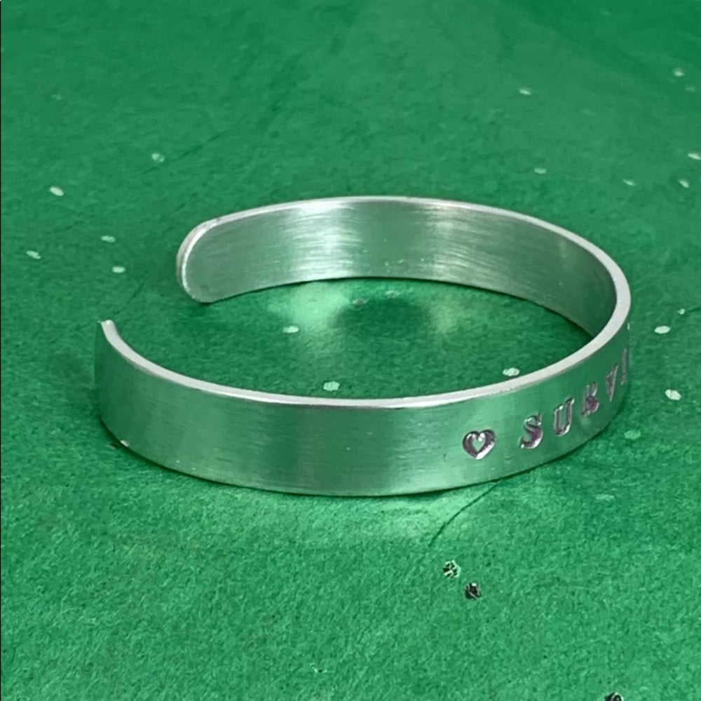 Adorned Crown stamped cuff survivor pink bracelet