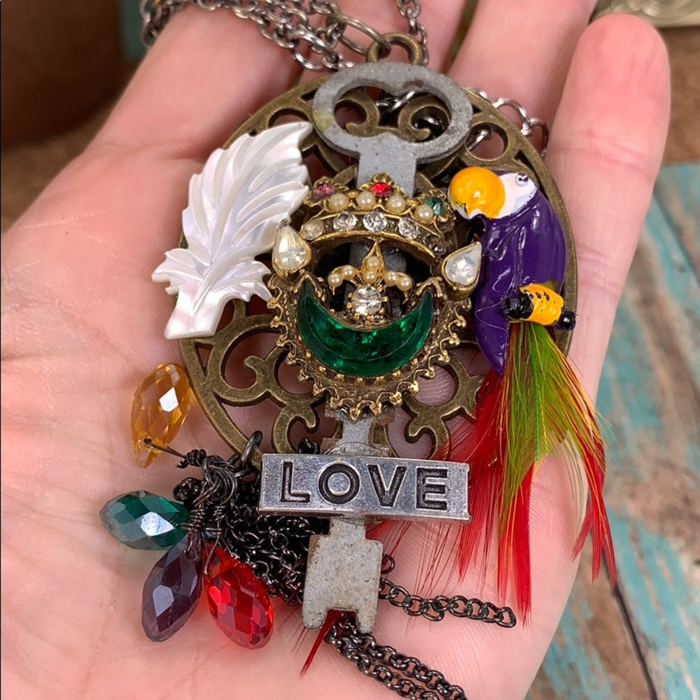 Adorned Crown artisan assemblage jungle toucan bird key cluster necklace