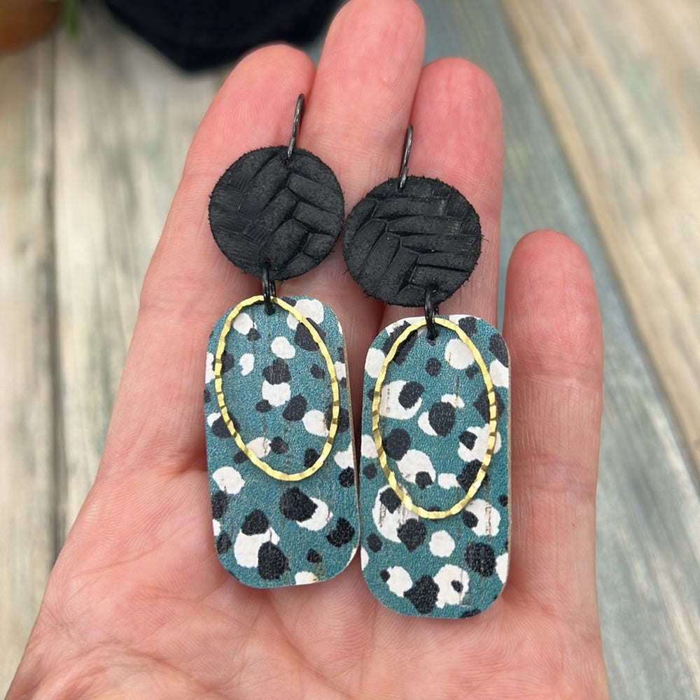 Adorned Crown Artisan Assemblage dotted leather faux leather oval earrings