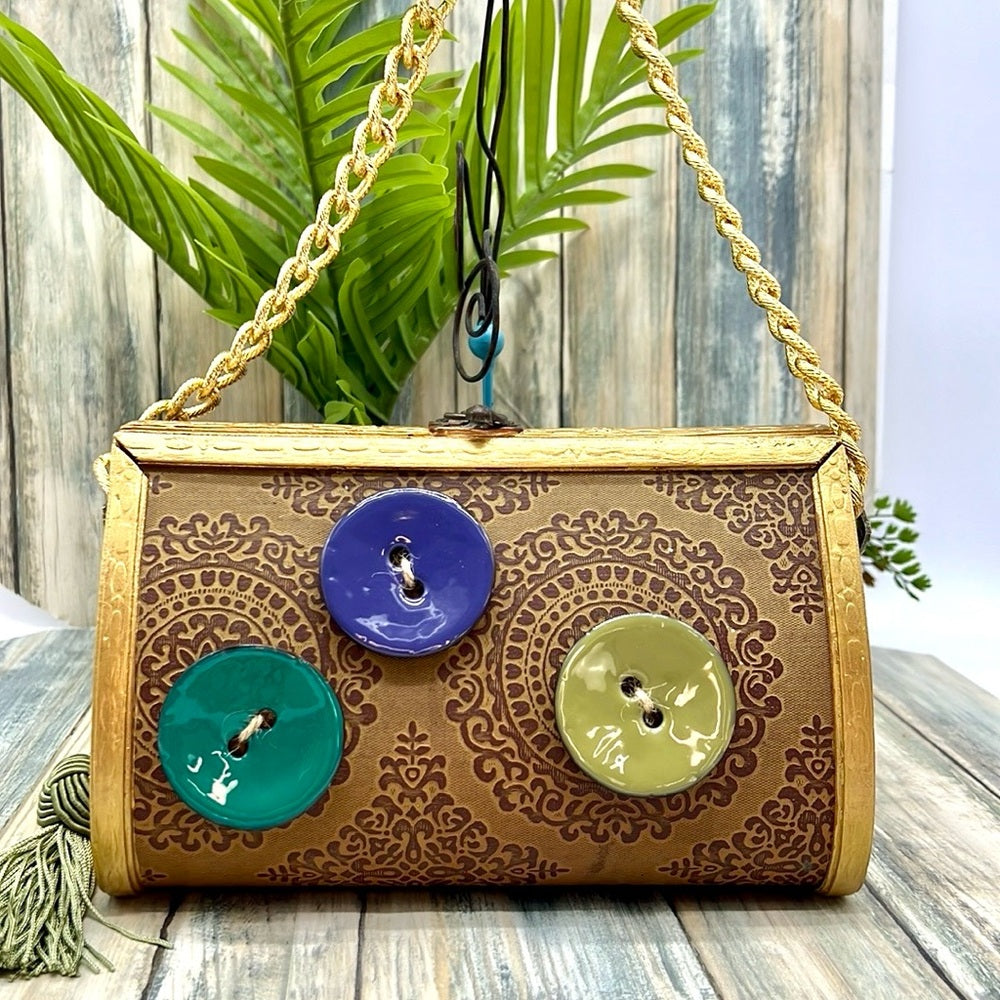 Adorned Crown Altered wood hinged big button gold handle green tassel purse
