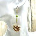 Adorned Crown Jewelry assemblage Christmas earrings gold bow green bead