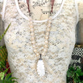 Adorned Crown artisan assemblage carved shell feather pearl silk necklace