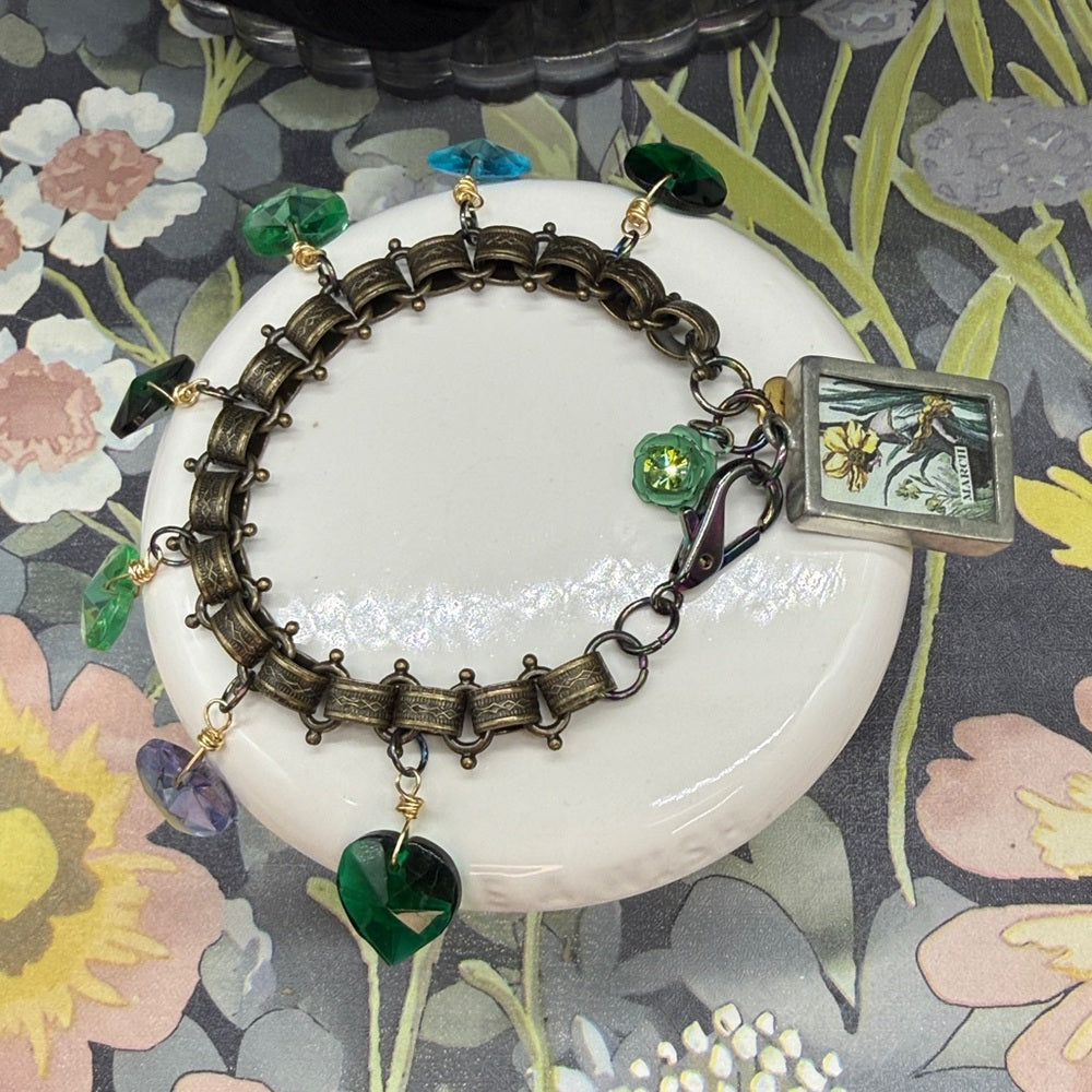 Adorned Crown Jewelry March glass heart bezel charm bracelet
