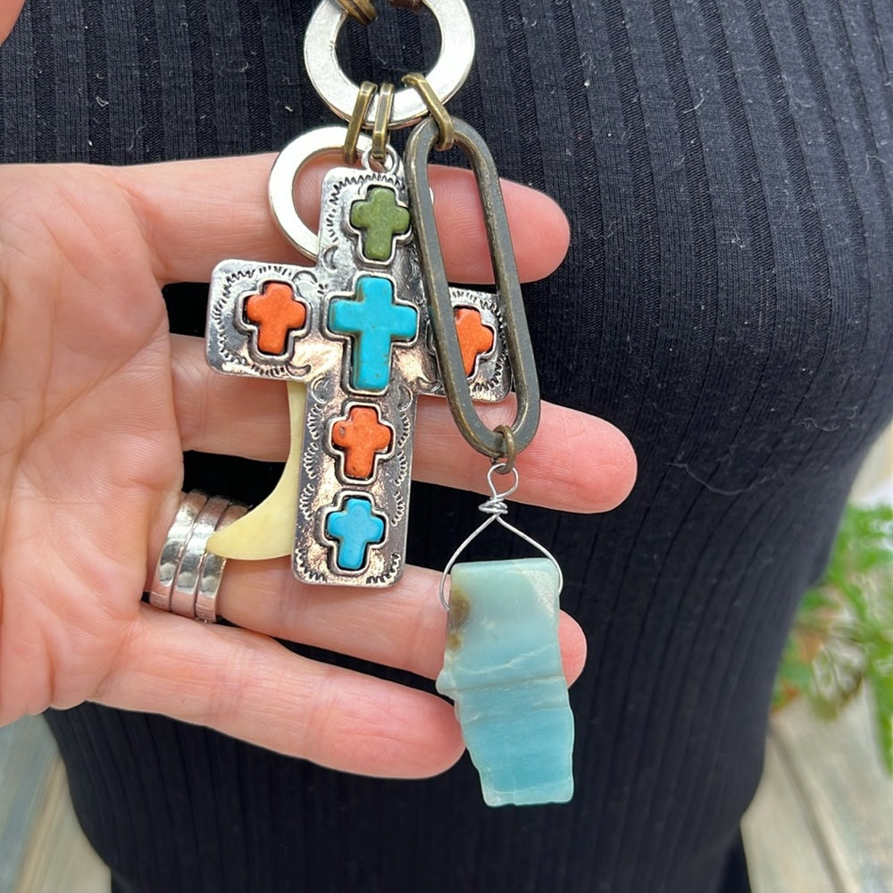 Adorned crown artisan assemblage turquoise cross bone larimar drop necklace