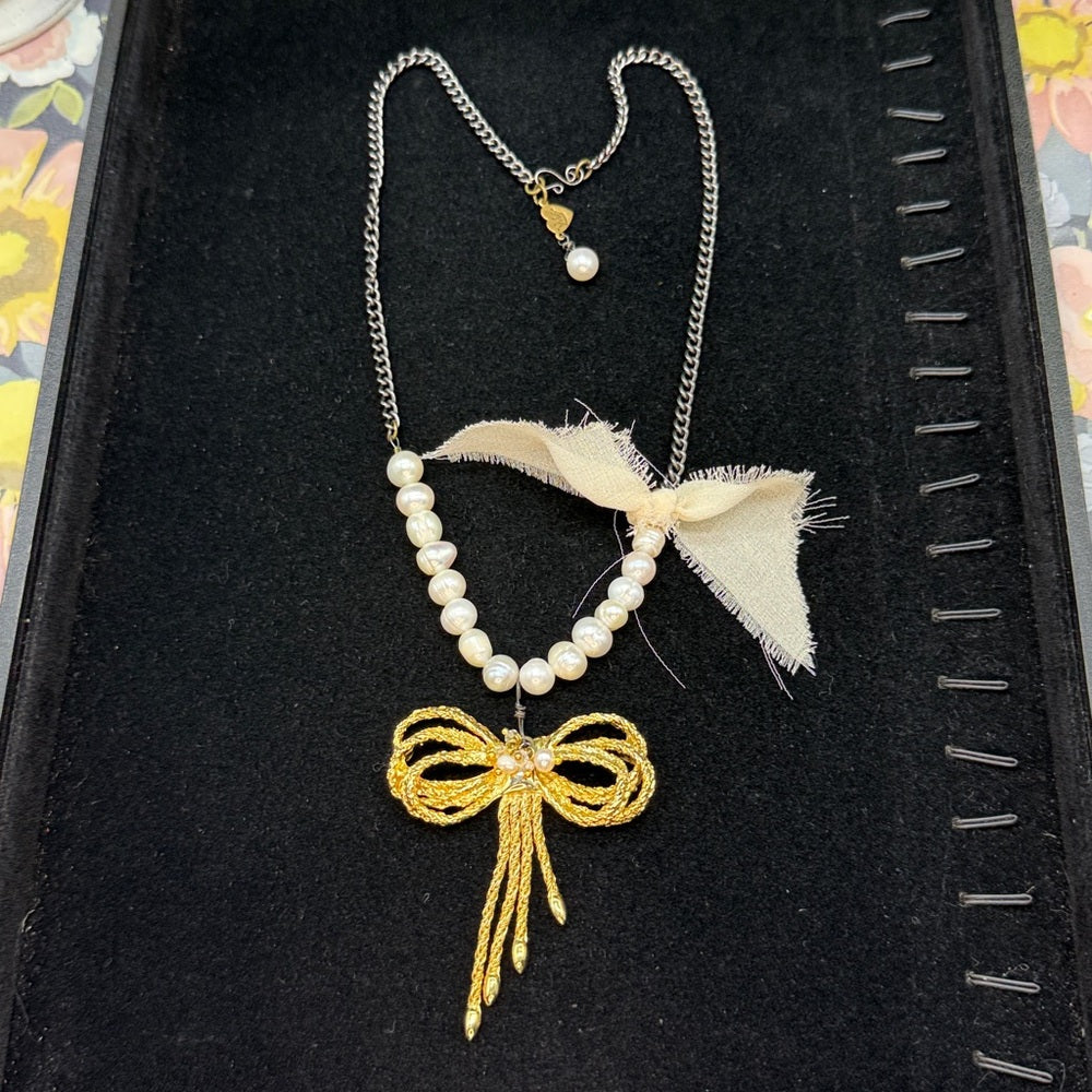 Adorned Crown Jewelry assemblage pearl gold bow necklace