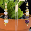 Adorned Crown Jewelry assemblage purple asymmetrical stone post earrings