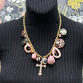 Adorned Crown Jewelry assemblage pink rhinestone cross charm necklace